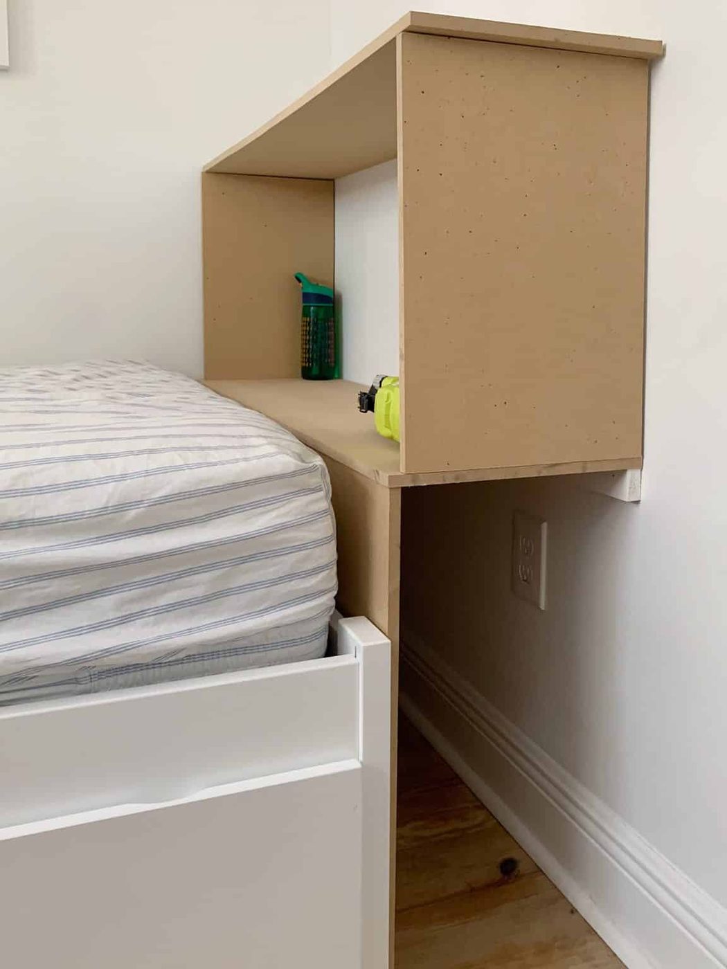 MDF frame of built-in bookcase in boys bedroom during Hands-on construction