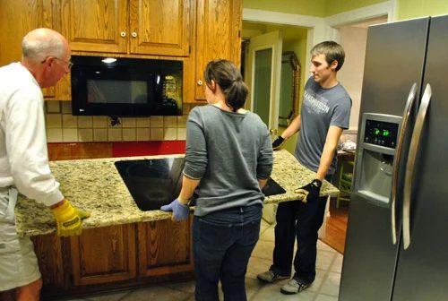 Rehanging Cabinets & Removing Granite Counters