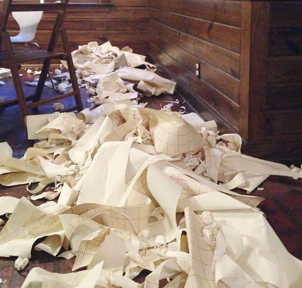 Took out Wallpaper Scraps On Floor Of Kitchen
