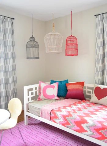 Hanging Decorative Birdcages In A Kids Room: a house log