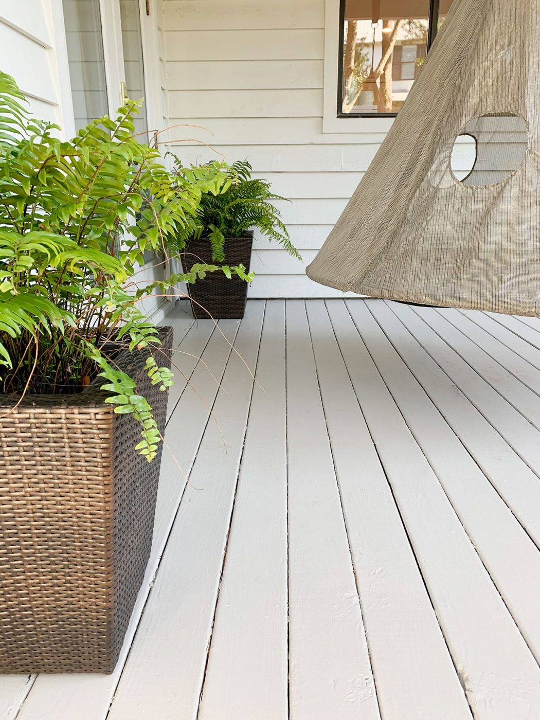Wrapped up painted gray porch floor detail
