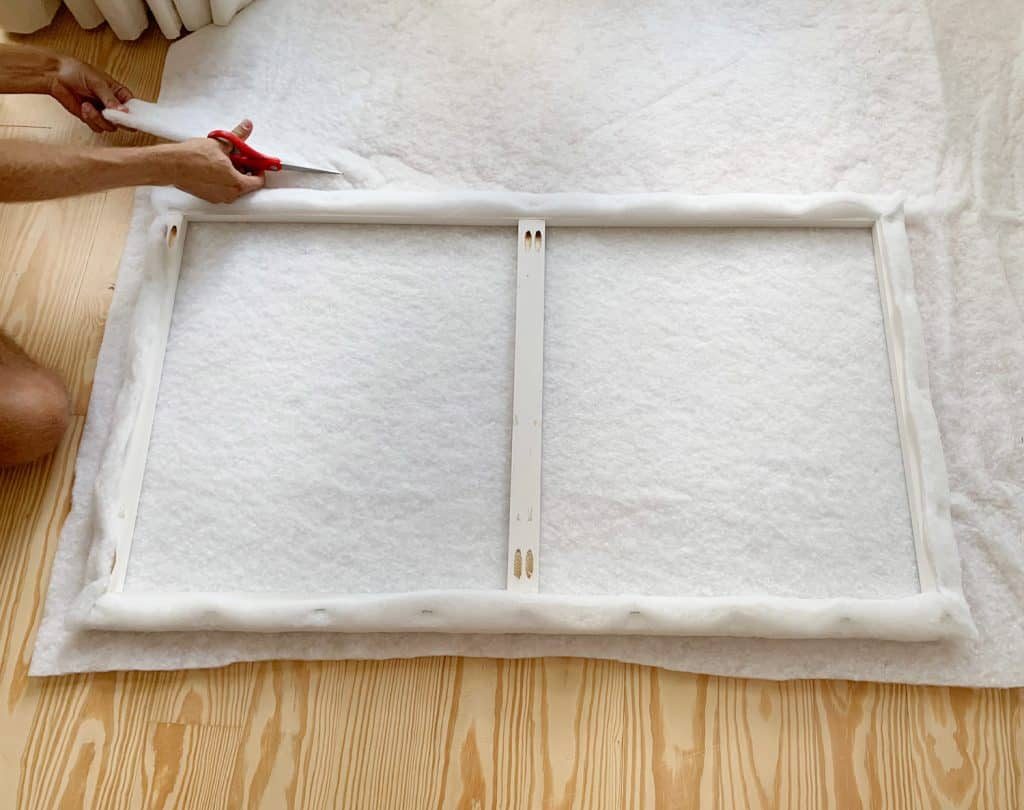 Cutting second layer of fabric batting for attaching to Hands-on upholstered headboard