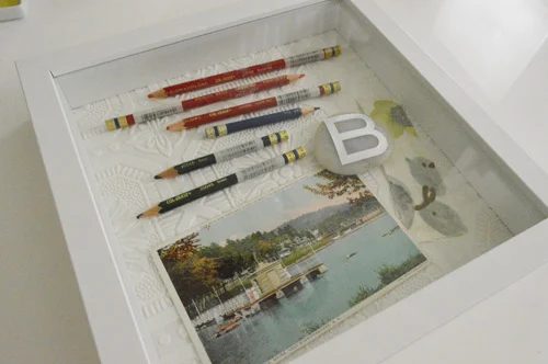 Framing Keepsakes In Shadow Boxes: a house log