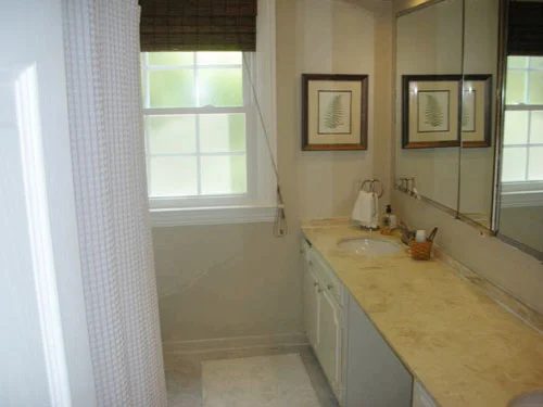 A Bathroom Makeover Alongside Vinyl Tile & Fresh Accessories