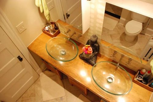 Striking Bathroom Reno With Vessel Sinks