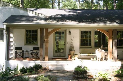 And Remarkable Porch With Limed Brick And A Glass Front Door