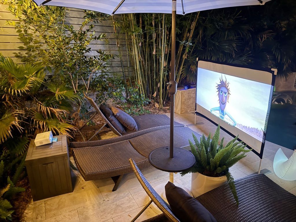 Projector Set Up Behind Outdoor Movie Screen