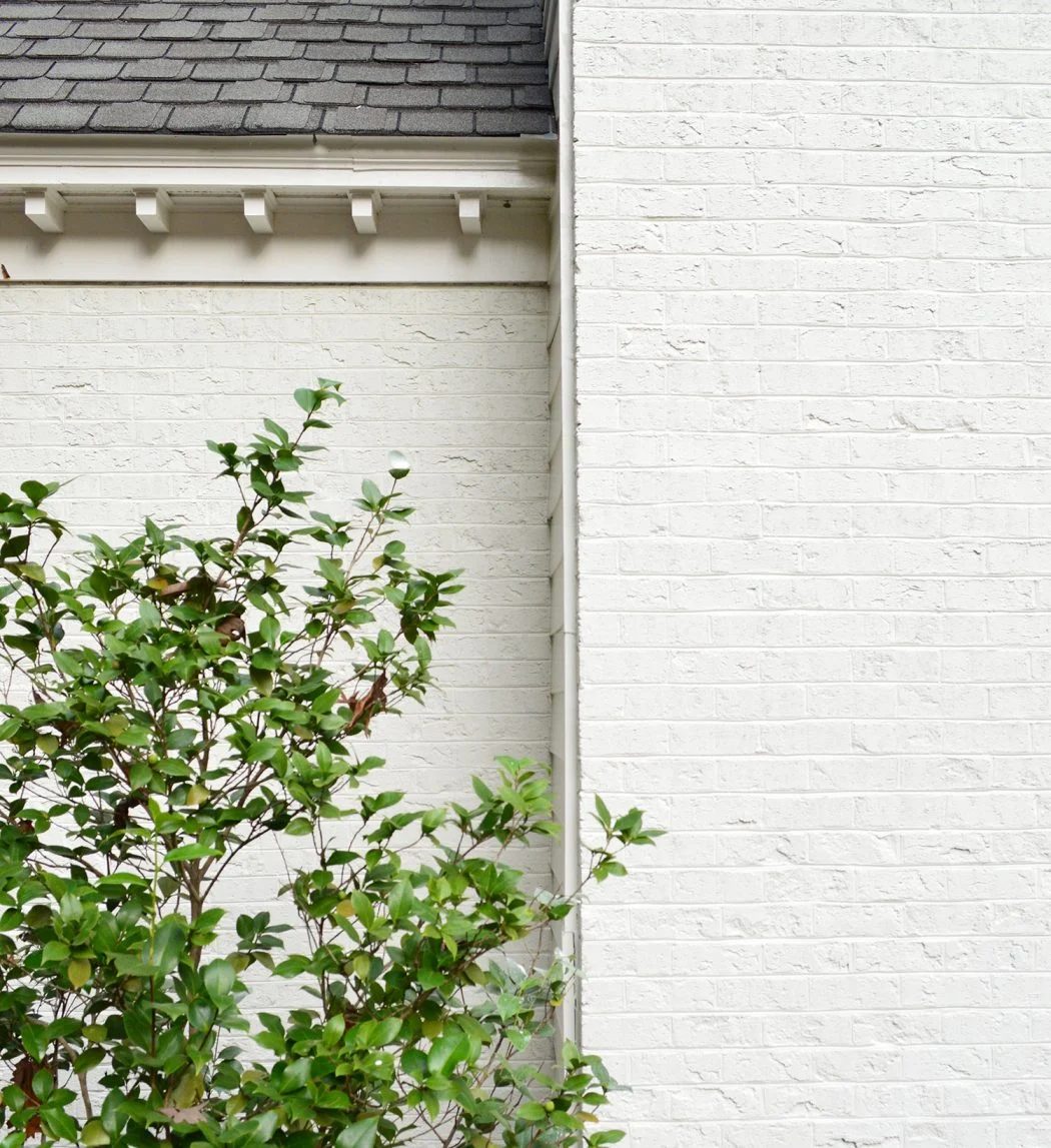 Close Up Photo Of Painted Brick Home