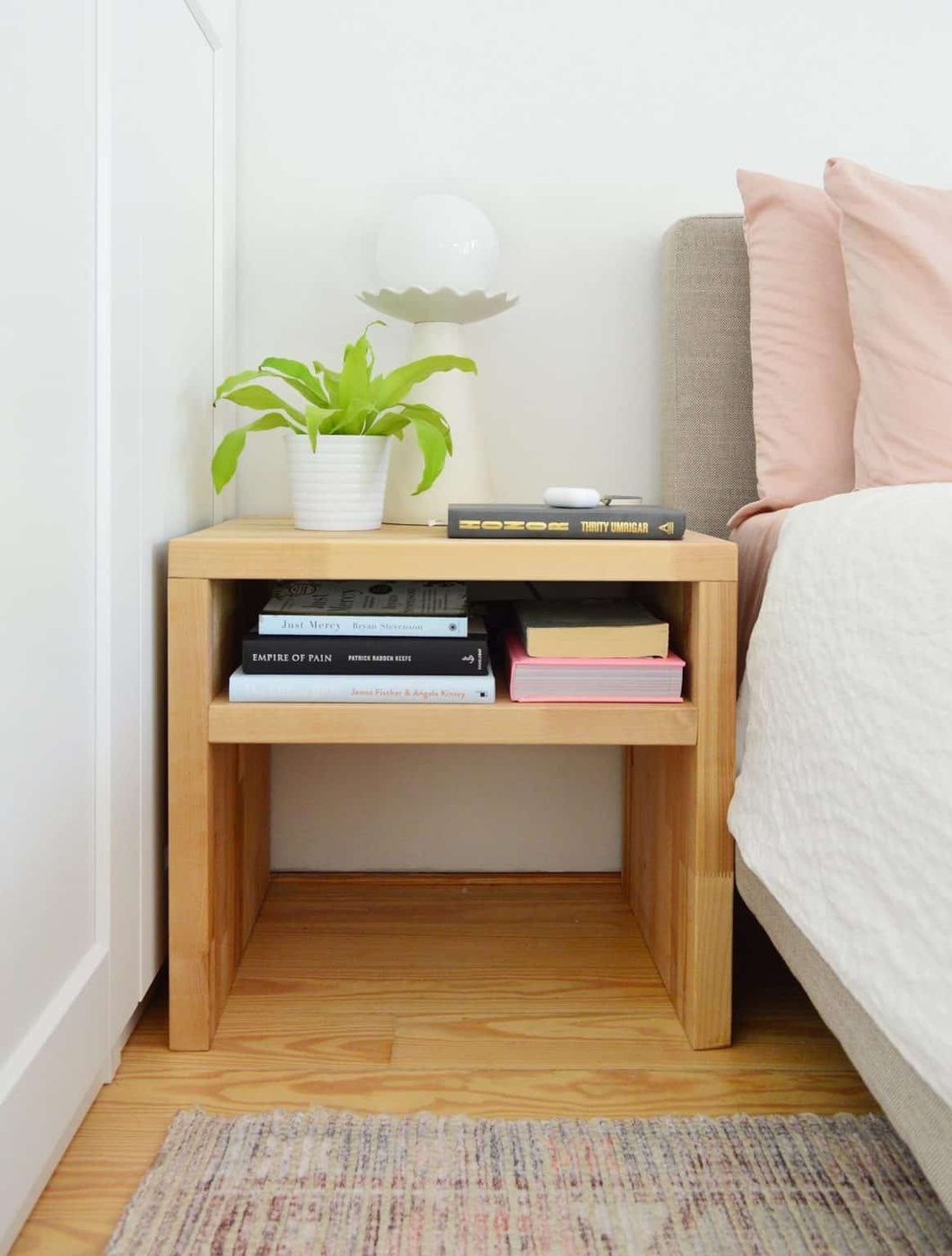 Modern Butcher Block Wood Hands-on Nightstand With Plant And Books