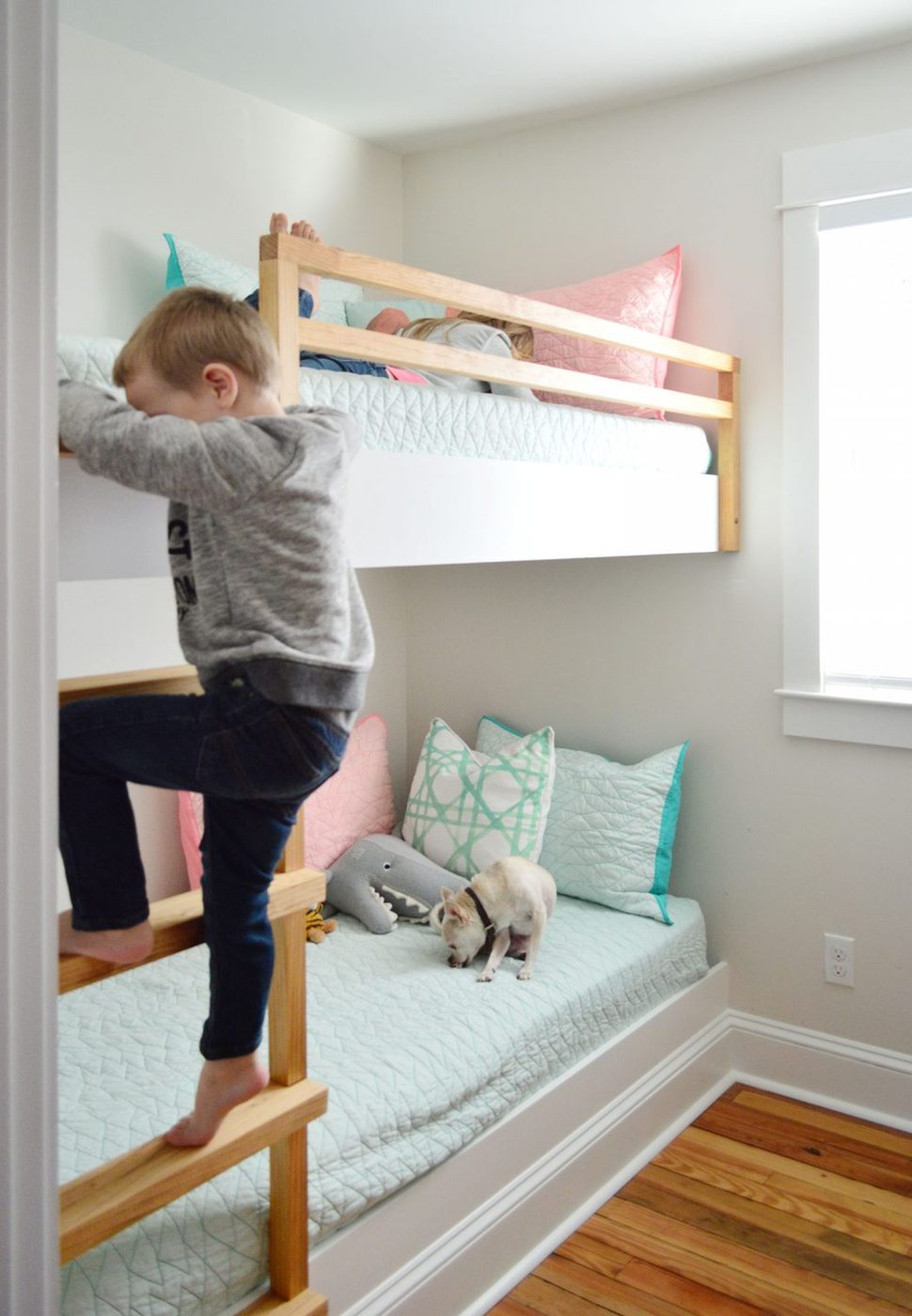 hands-on built in wall to wall bunk beds with child climbing ladder