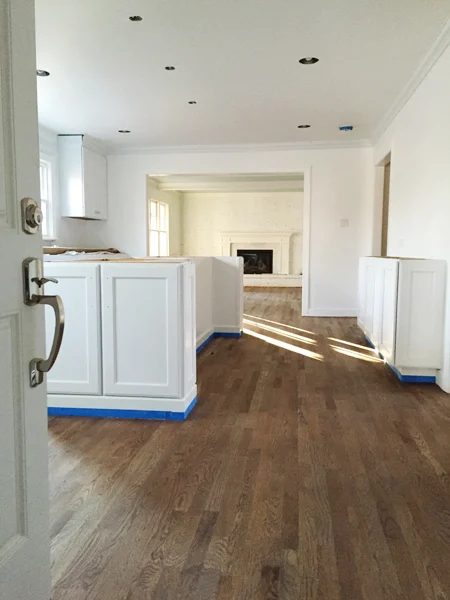 Refinishing The Hardwood Floors: Before & After