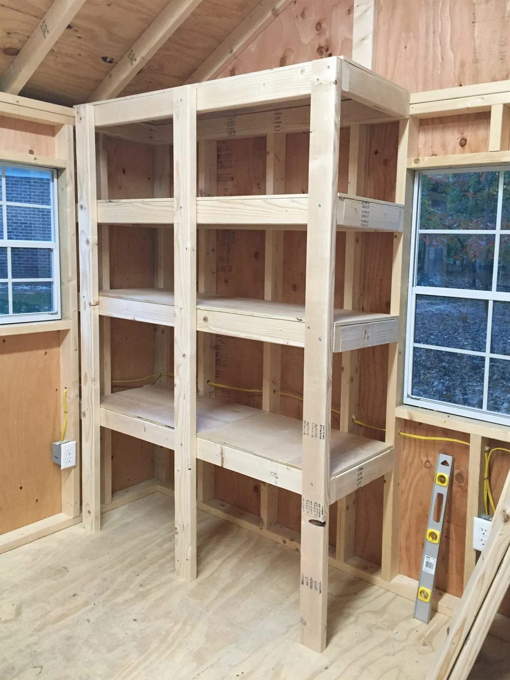 wrapped up Hands-on garage shelves with three vertial supports