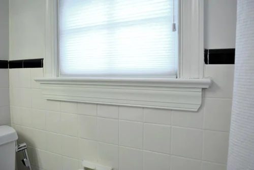 Hiding Damaged Tile Alongside Trim