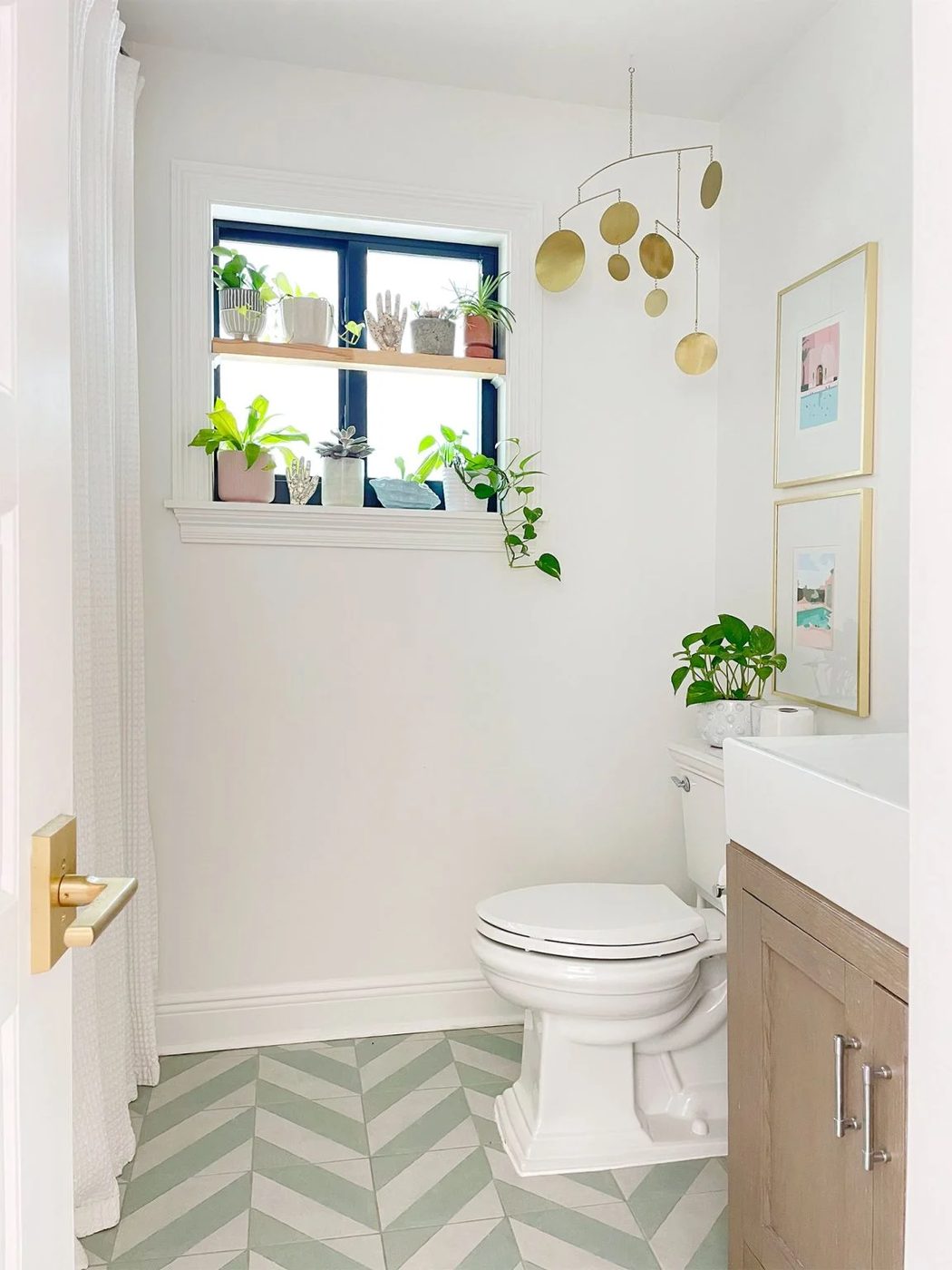 Modern White Bathroom With Mint Chevron Floor And Hands-on window plant shelf