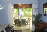 How to Hang Curtains on a Sliding Glass Door: Tips & Styles