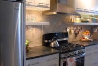 White Kitchen with Black Countertops and Open Shelving Ideas