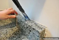 How We Removed the Side Splash and Backsplash From Our Bathroom Sink