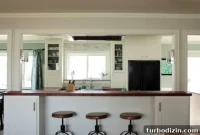 Glass-Front Cabinets, Wood Counters & Marble Backsplash Kitchen