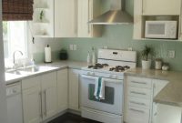 White Kitchen with Green Glass Mosaic Backsplash Tile Ideas