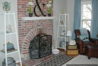 Cozy Family Room with Brick Fireplace and Blue Curtains