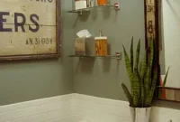Sage Green Bathroom Design with Chic Orange Accents
