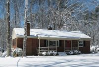 Snow-Covered Brick Ranch: Winter Curb Appeal Ideas