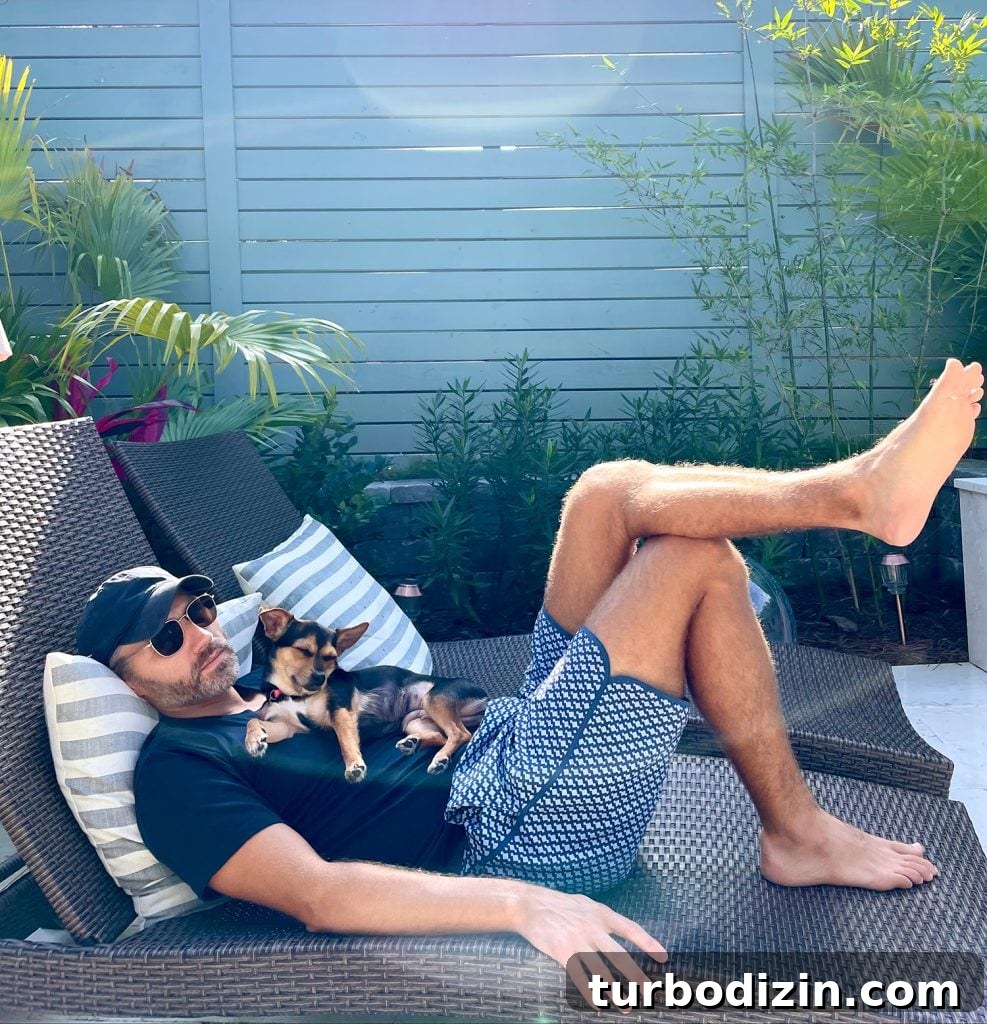 Meet Penny Petersik: Designer, Author, and Home Style Expert 17 Penny and John sleeping together on pool patio lounger