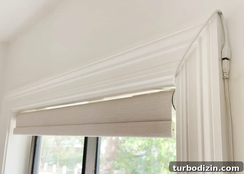 How to Install Smart Motorized Window Blinds 9 Detail of Power Cord Running To Smart Roller Shade Blackout Blinds