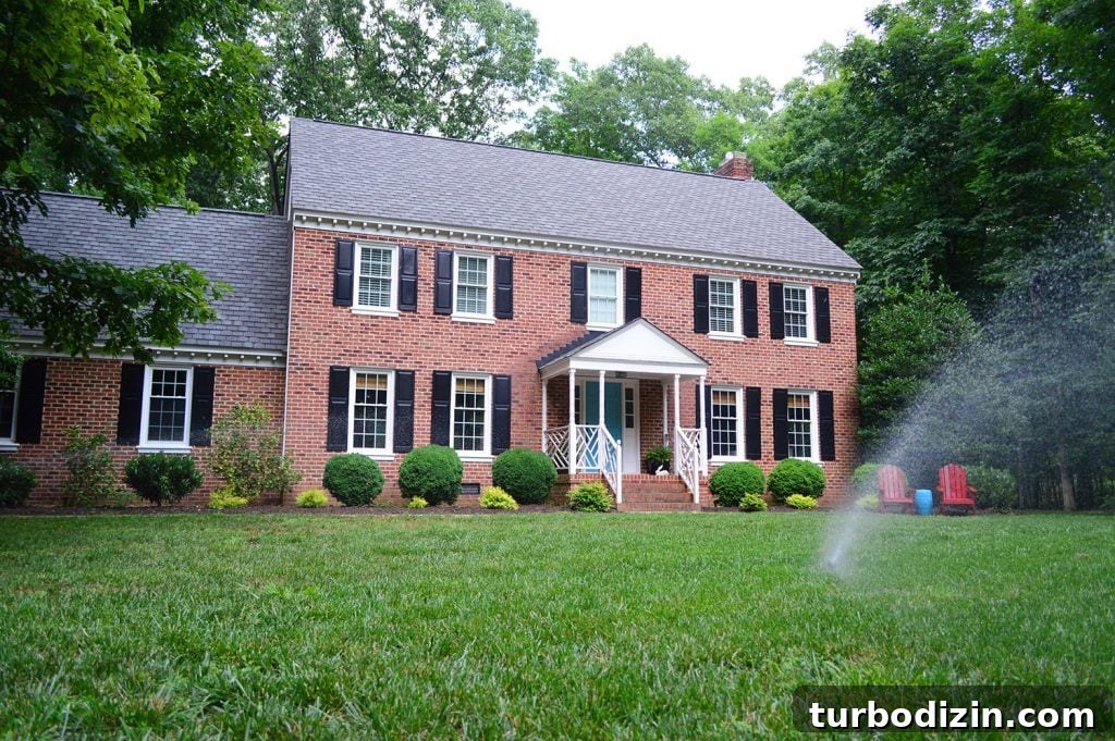 Top Smart Home Tech: Must-Have Devices for Modern Living 11 Brick House With Irrigation Sprinkler System Running In Front Yard