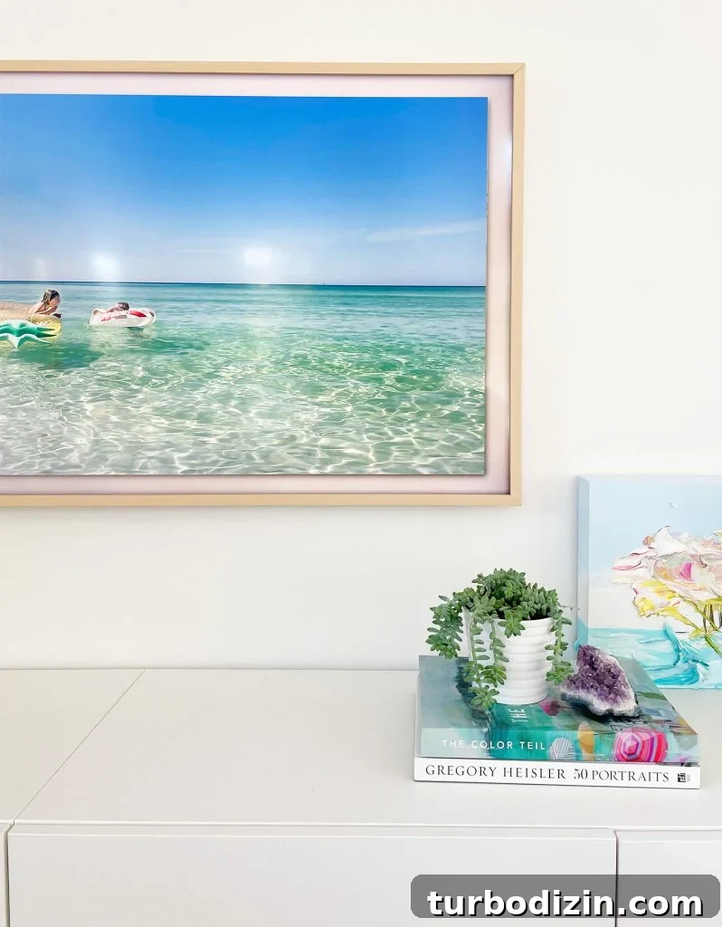 Top Smart Home Tech: Must-Have Devices for Modern Living 9 Samsung Frame Smart TV With Beige Bezel And Beachy Decor