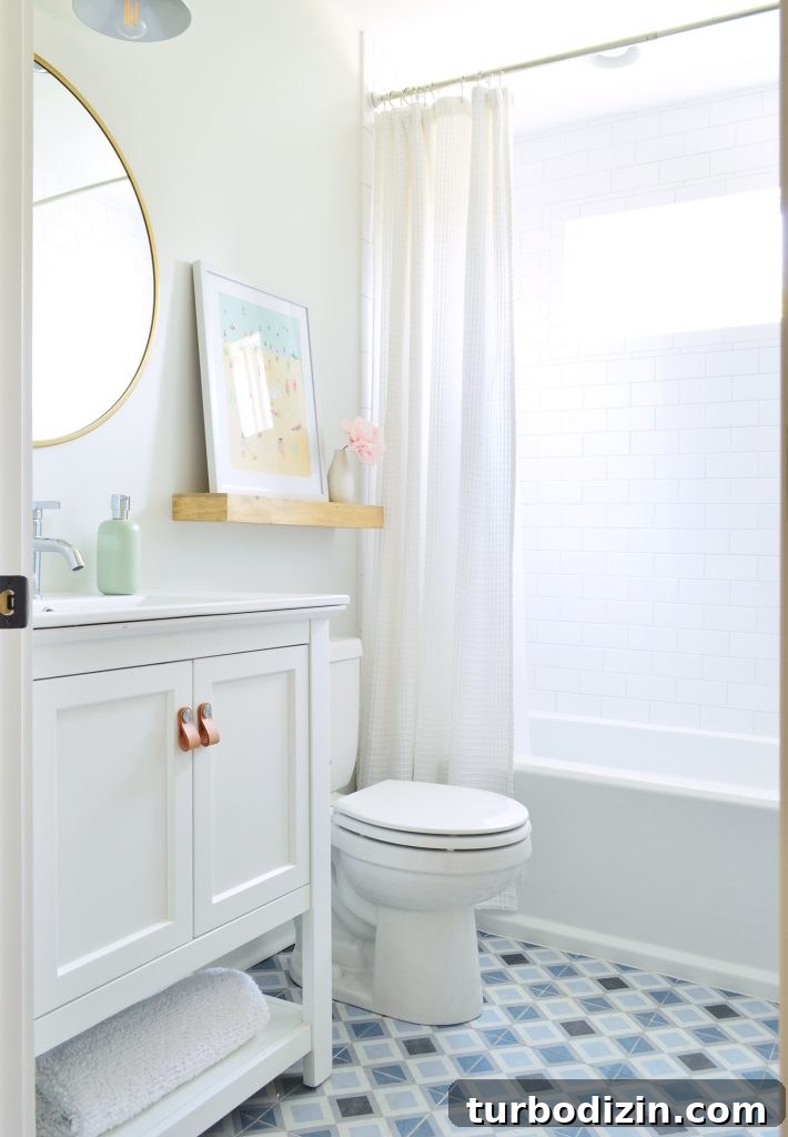 Our Favorite Toilet: A Complete Guide to the Top Pick 8 Duplex bathroom with white walls subway tile shower and blue patterned tile floor