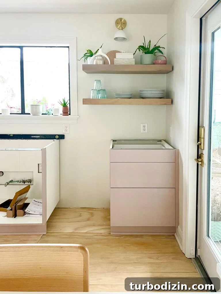 How to Paint IKEA Kitchen Cabinets Like a Pro 14 Ikea Kitchen Halfway Assembled With Painted Drawered Cabinet