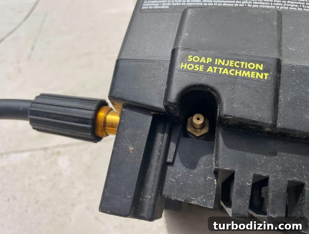 Soap Injection Hose Attachment nozzle on side of Ryobi Electric Pressure Washer