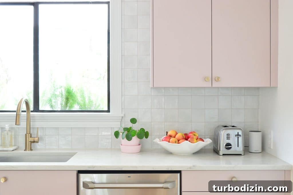 Ikea Kitchen Makeover: Smart Renovation Ideas for Small Spaces 9 Closer View Of Square Tile Backsplash With Mauve Pink Painted Cabinets