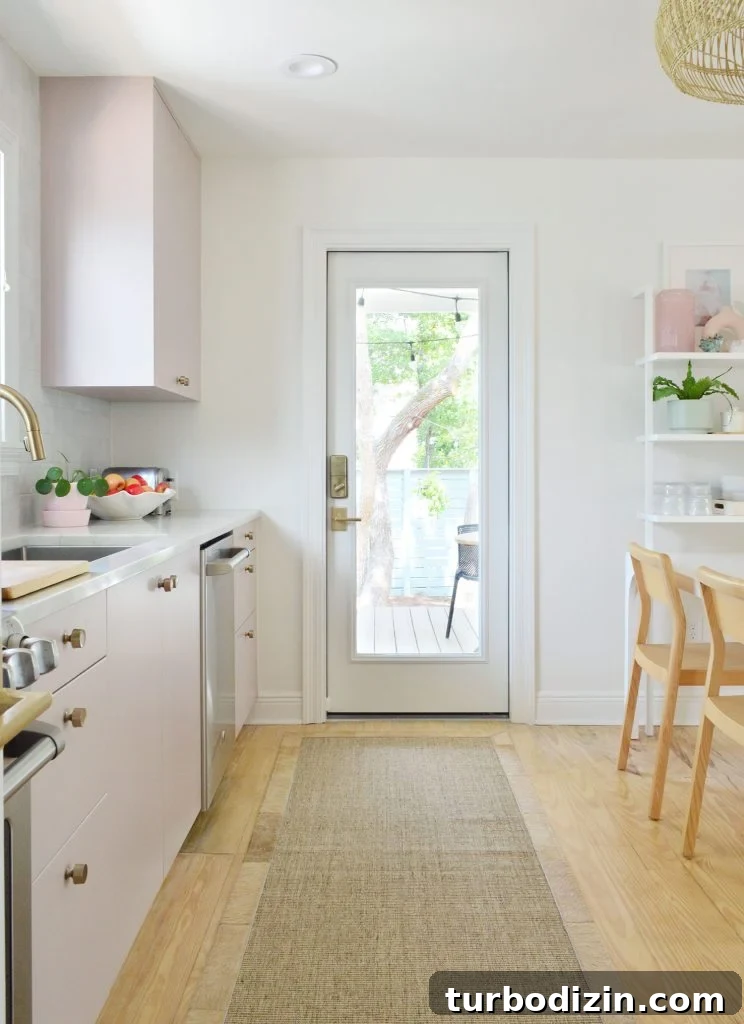 Ikea Kitchen Makeover: Smart Renovation Ideas for Small Spaces 16 View Towards Kitchen Porch Door In Painted Mauve Pink Ikea Kitchen With Jute Runner