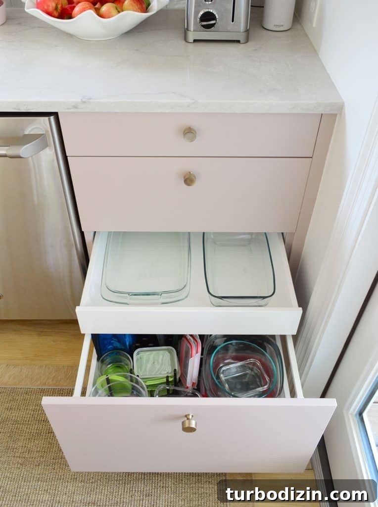 Small Ikea Kitchen Organization Ideas for Tight Spaces 9 Hidden Drawer In Ikea Kitchen With Glass Bakeware