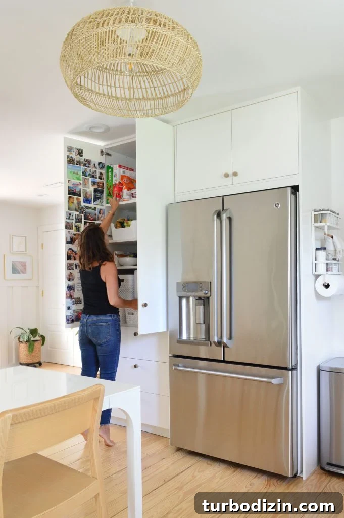 Small Ikea Kitchen Organization Ideas for Tight Spaces 16 Sherry Standing In Front Of Open Ikea Pantry Cabinets Built To Ceiling