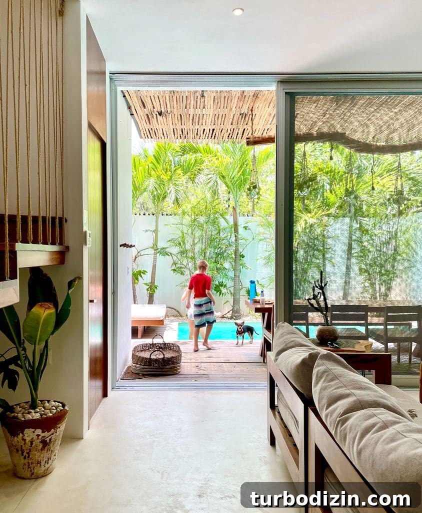 Traveling to Mexico with Kids and a Dog: Family Guide 3 Boy And Dog At Boho Chic Mexican Airbnb Pool