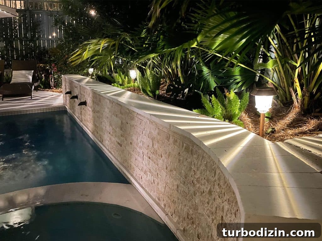 Top-Rated Outdoor Solar Lights for Bright, Reliable Yard Lighting 4 LED Solar Pathway Lights Along Retaining Wall Near Backyard Pool
