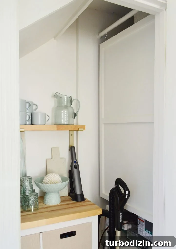 Wood Cover Panel Hanging In Utility Closet To Hide HVAC Unit