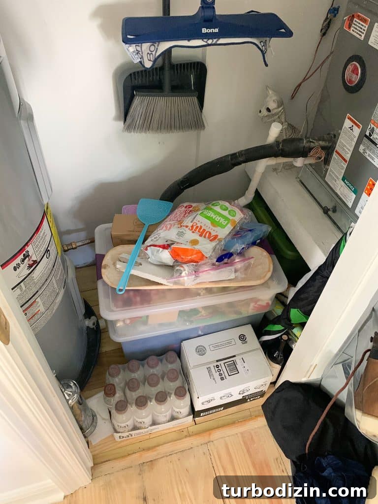 Random Storage Thrown On Floor Of Utility Closet