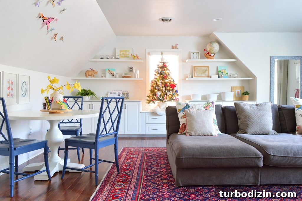 Rooms You Don't Miss After Downsizing: What to Leave Behind 11 Bonus Room With Large Couch And Drawing Table With Ornate Blue Chairs