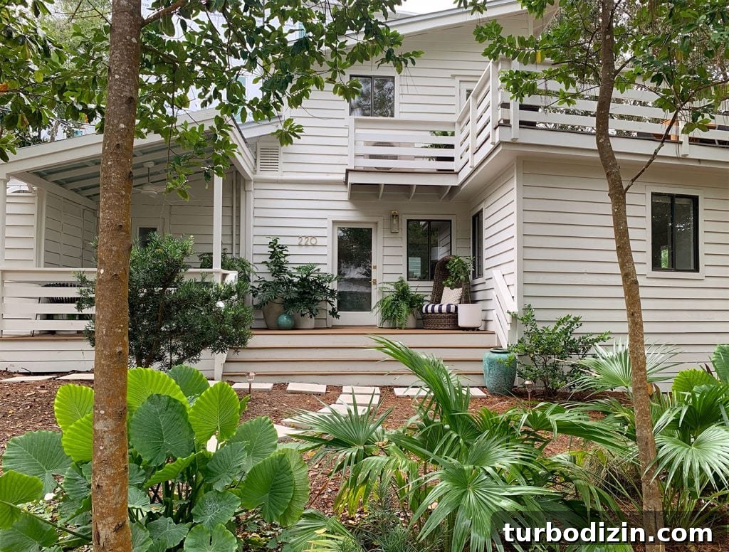 Rooms You Don't Miss After Downsizing: What to Leave Behind 3 House With White Siding And Tropical Plantings