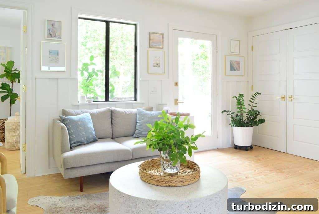 Rooms You Don't Miss After Downsizing: What to Leave Behind 8 View Of Seating Area And Front Door With Laundry Closet In Background