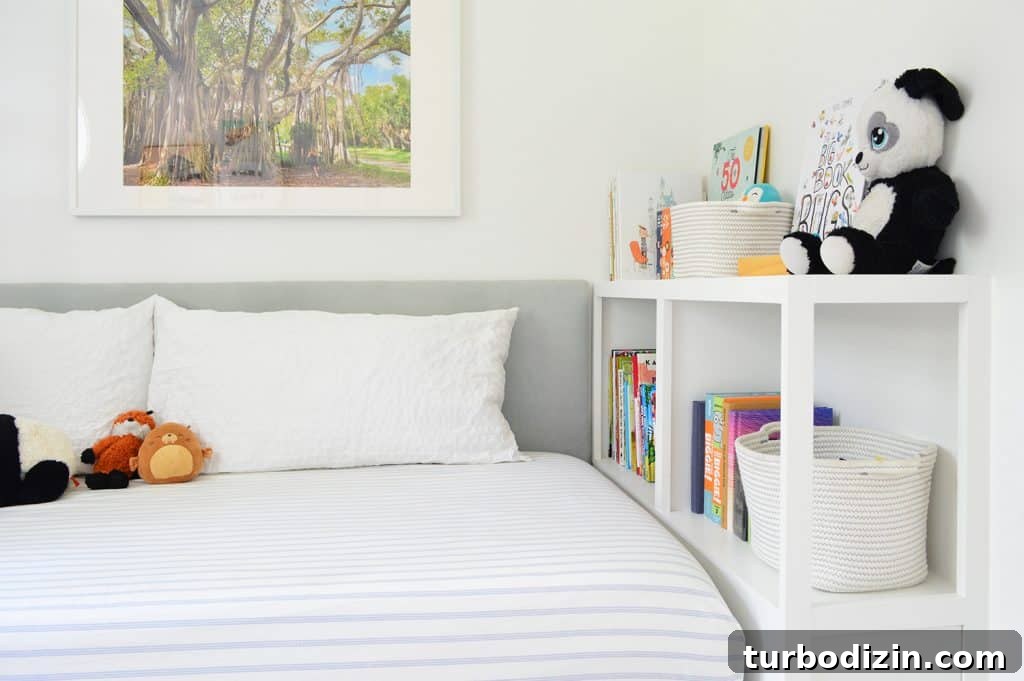 Build a Sturdy Bookshelf: Step-by-Step DIY Guide for Any Room 11 After photo of built-in bookcase at foot of bed with books and stuffed animals