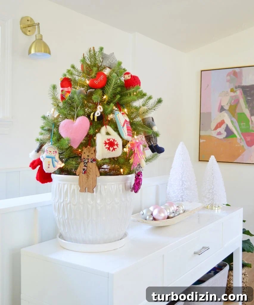 Small Tabletop Tree In White Pot With Colorful Ornaments