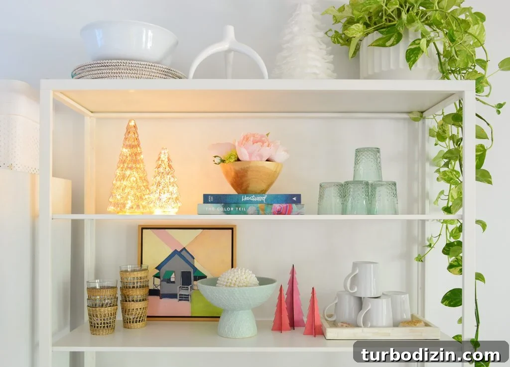White Metal Kitchen Shelves With Lighted And Colorful Christmas Trees