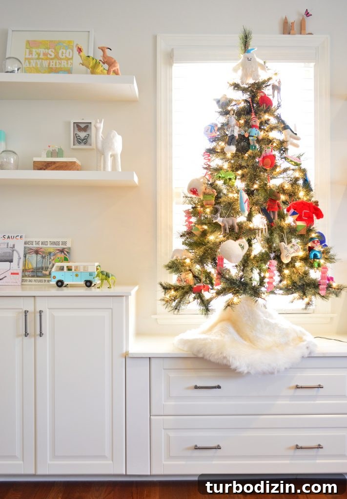 Artificial Tabletop Christmas Tree Next To Kids Toy Shelves