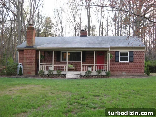 img_8651 Small brick ranch home with propane tank in the corner