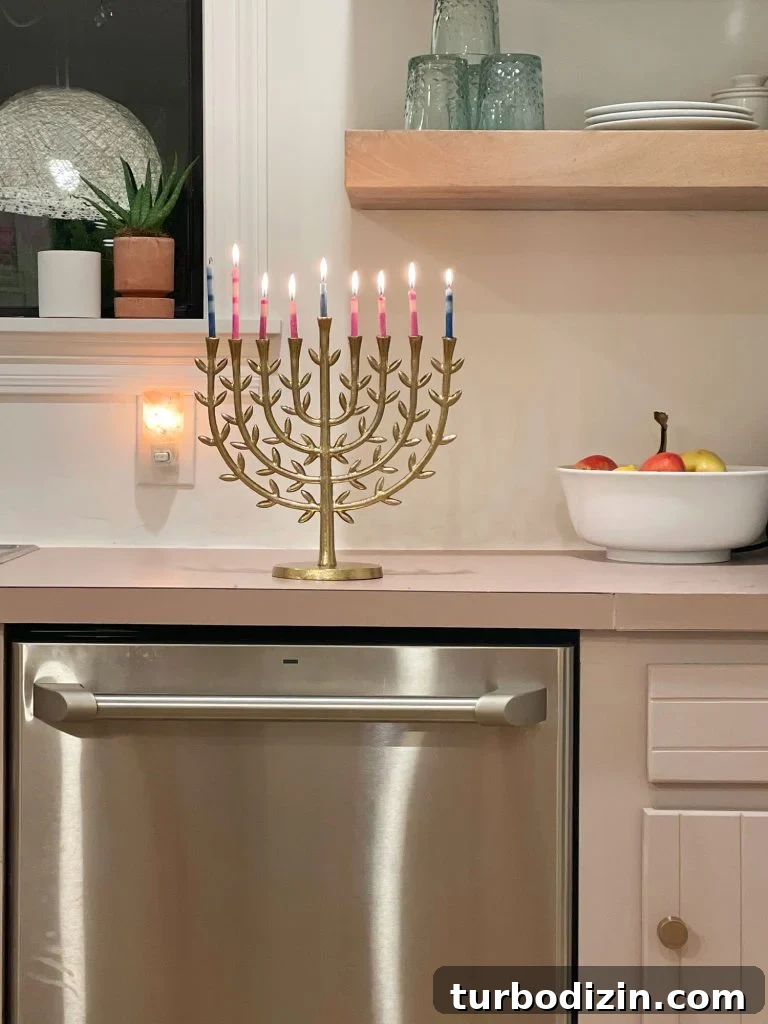 Gold leafy menorah on kitchen table